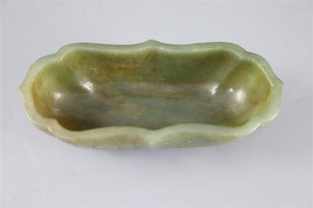 A Chinese inscribed green jade brushwasher, 16cm wide